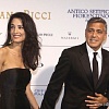 Папарацци подловили Джорджа Клуни, целующегося с блондинкой