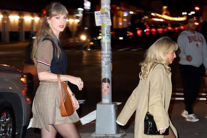 Давид и Голиаф: папарацци поймали выходящих из ресторана Сабрину Карпентер и Тэйлор Свифт