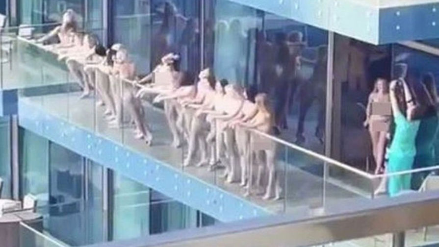 Кто заставил 40 голых девушек выйти на балкон в Дубаи?